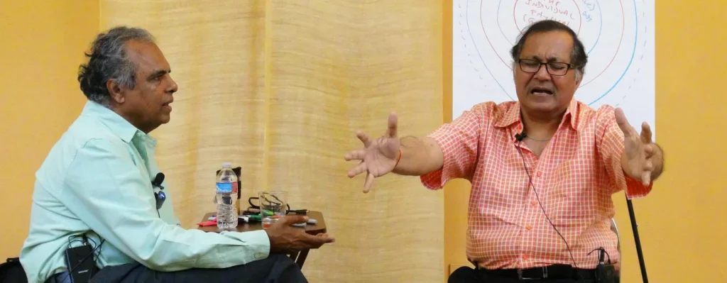 Dr. Raja Selvam demonstrating emotional embodiment and improved cognitive outcomes during a demonstration session with a man